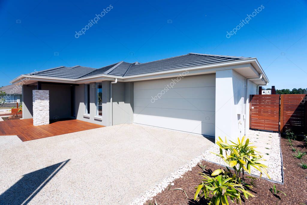 Fron view of a modern house with garage