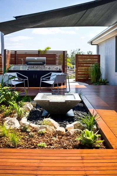 A luxury backyard home garden with lounge space