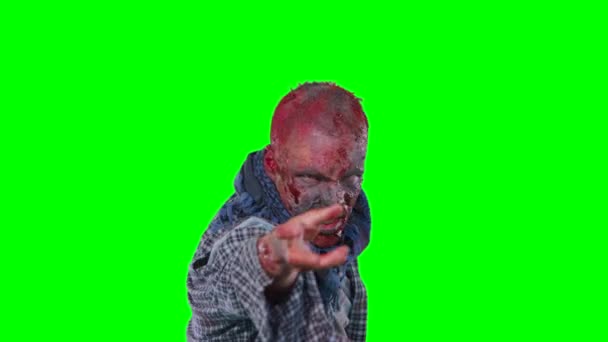 Scary zombie in halloween isolated green background — Stock Video