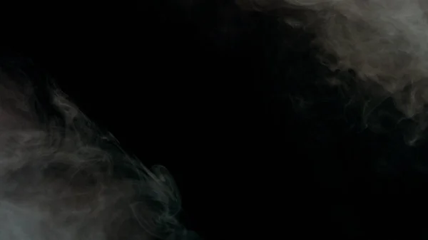Färgglada rök på mörk bakgrund — Stockfoto