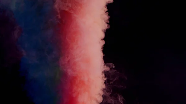 Humo colorido sobre fondo oscuro — Foto de Stock