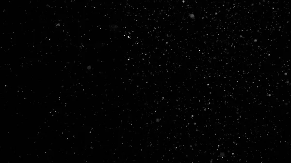 White Snow Falling on Isolated Black Background — Stock Photo, Image