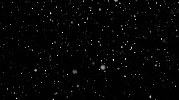 Vit snö faller på isolerad svart bakgrund — Stockfoto