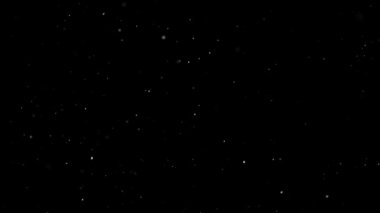 İzole edilmiş Siyah Arkaplana Beyaz Kar Düşüyor