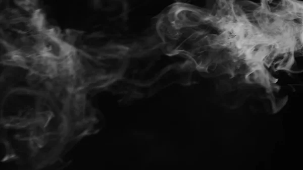 Humo blanco sobre fondo negro — Foto de Stock