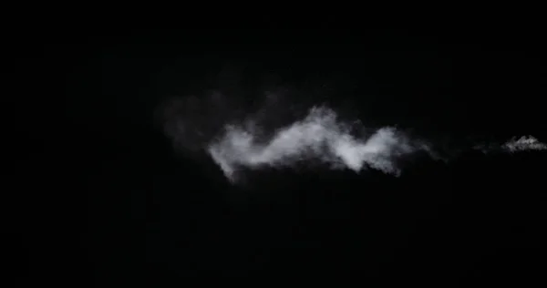 Білий дим Trail ізольований на чорному фоні — стокове фото