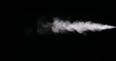 White Smoke Trail Isolated on Black Background clipart