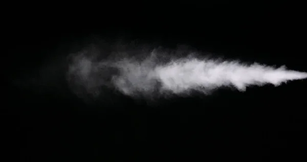 Huella de humo blanca aislada sobre fondo negro —  Fotos de Stock