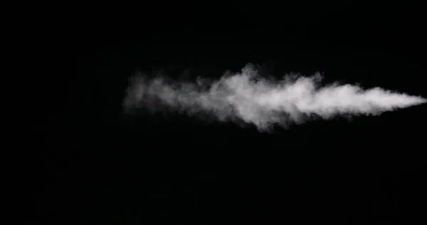 Huella de humo blanca aislada sobre fondo negro —  Fotos de Stock