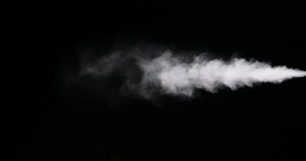 Huella de humo blanca aislada sobre fondo negro —  Fotos de Stock