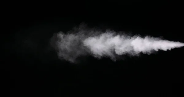 Weiße Rauchspur isoliert auf schwarzem Hintergrund — Stockfoto