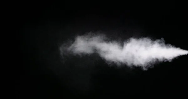 黒い背景に隔離された白い煙の道 — ストック写真