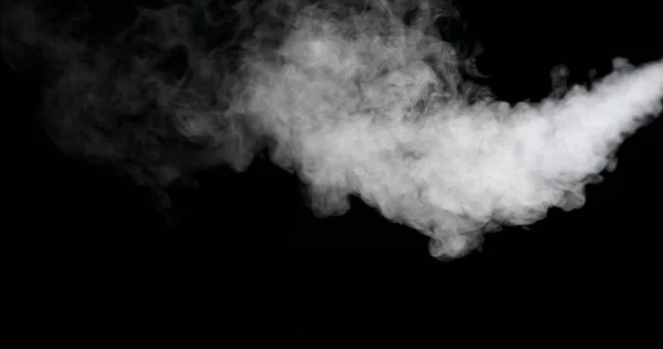 Huella de humo blanca aislada sobre fondo negro —  Fotos de Stock