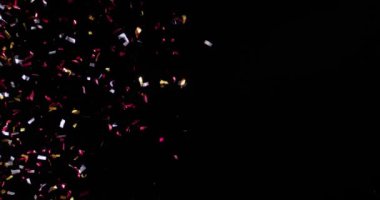 Siyah arka plan üzerine izole konfeti