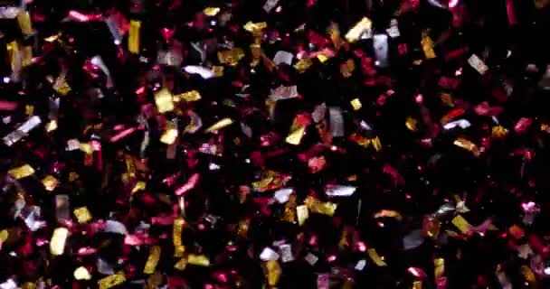 Confetti geïsoleerd op zwarte achtergrond — Stockvideo