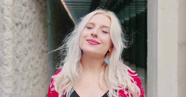 Young Blonde Lady Smiling Outdoors — Stock Video