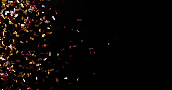 Confetti Isolated on Black Background