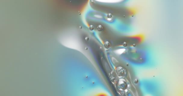 Bubblor på smältande plast — Stockvideo