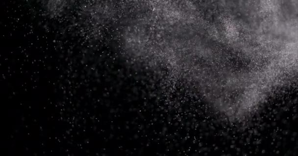在黑色背景上分离的粉末 — 图库视频影像