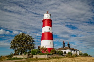 Happisburgh deniz feneri situtated Norfolk'taki güzel sonbahar güneşinin, İngiltere