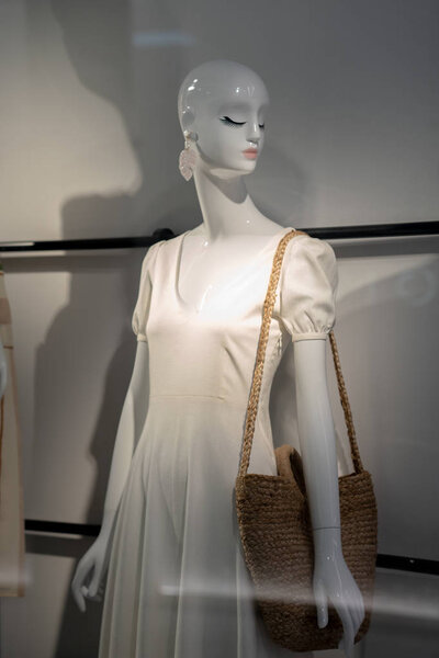 Mannequin of womens clothing in the shop window