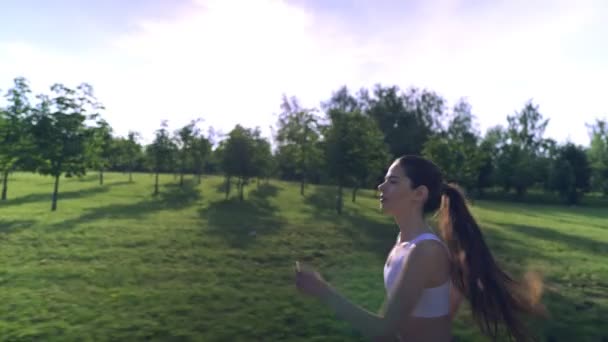 Young women are exercising with outdoor running. Concept healthy running and outdoor exercise — Stock Video