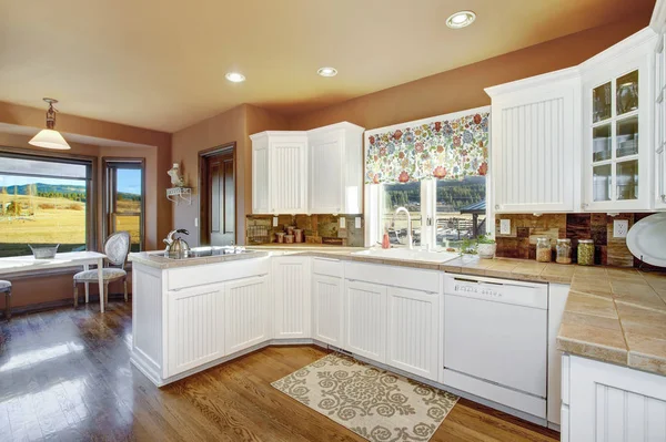 Country Kitchen Features White Cabinets Tile Countertop Rustic Plank Backsplash — Stock Photo, Image