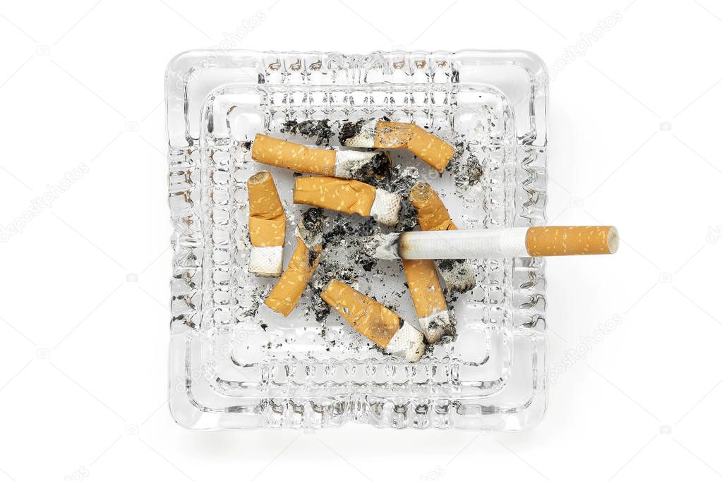 glass ashtray with cigarettes isolated on white, top view