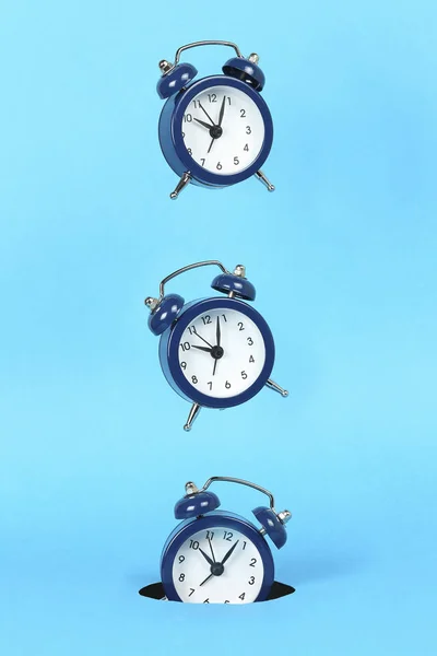 Falling alarm clock — Stock Photo, Image