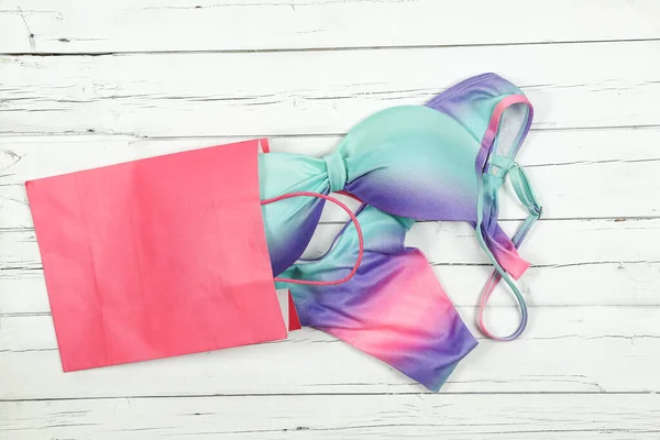 Colorful Bikini Out Shopping Bag White Wood — Stock Photo, Image