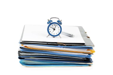 alarm clock on stack of paper and folders, concept for paperwork clipart