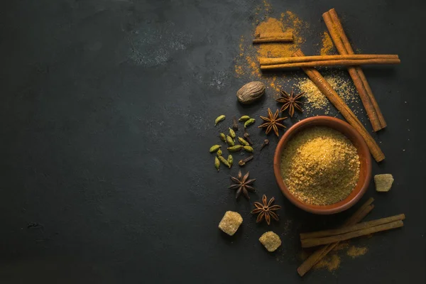 Cinnamon variety on dark table — Stock Photo, Image