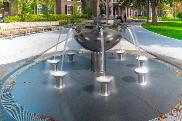 The Weston Family Fountain in the Grange Park. The park is located behind the Art Gallery of  Ontario and it is a tourist attraction in the Canadian city