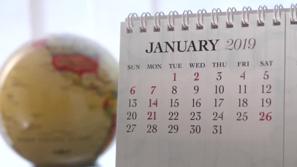 Rörelse Januari 2019 Kalender Med Oskärpa Jorden Världen Vänder Bakgrund — Stockvideo