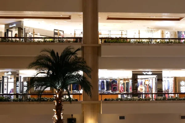 Close up of high rise hotel building inside big shopping mall — Stock Photo, Image