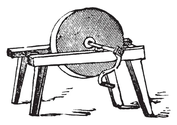 This illustration represents Grindstone which is a round sharpening stoneusedfor grinding or sharpening ferrous tools, vintage line drawing or engraving illustration.