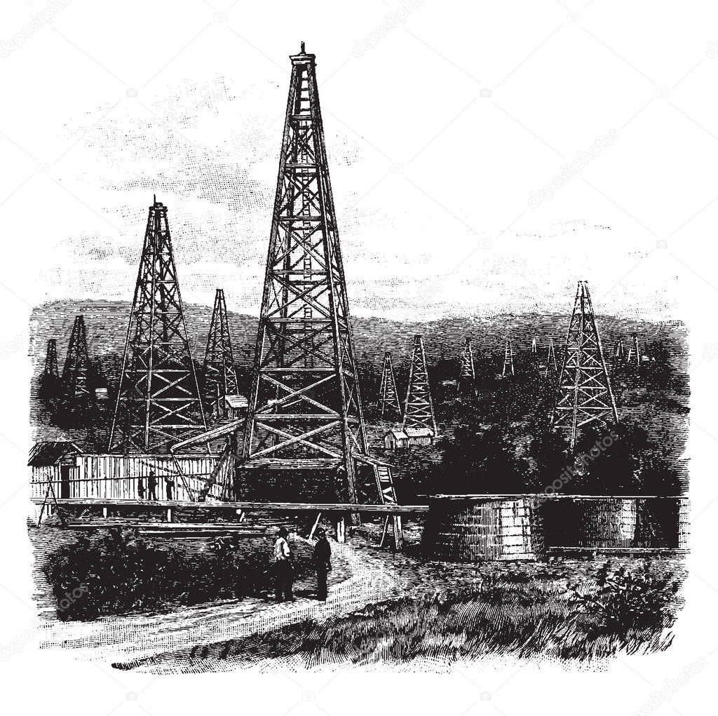 This illustration represents a field of oil wells, vintage line drawing or engraving illustration.