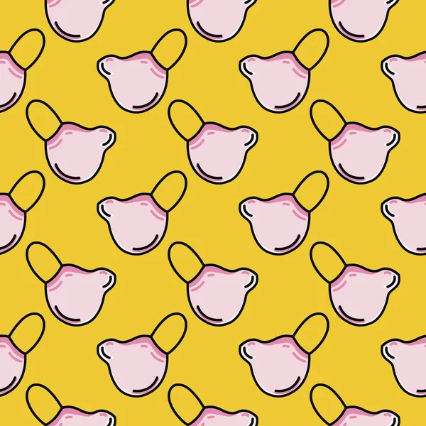 Pembe maske, sarı arkaplanda pürüzsüz desen..