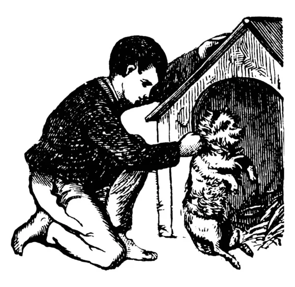 一个小男孩和他的狗在狗的狗窝前玩耍 狗站在他的两只脚的老式线条上 或者是雕刻插图 — 图库矢量图片