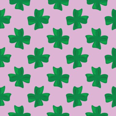 Yeşil yonca, pembe arka planda pürüzsüz desen.