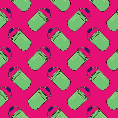 Yeşil boya kovası, parlak pembe arka planda pürüzsüz desen..