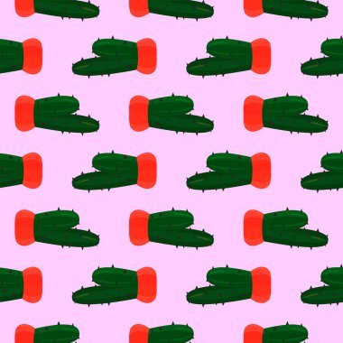 Kırmızı tencerede küçük bir kaktüs, bebek pembe arka planda pürüzsüz desen..