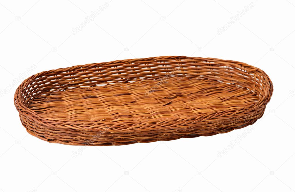Brown wicker basket isolated on white background