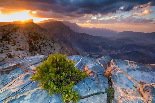 sun rise over Mountain Peaks