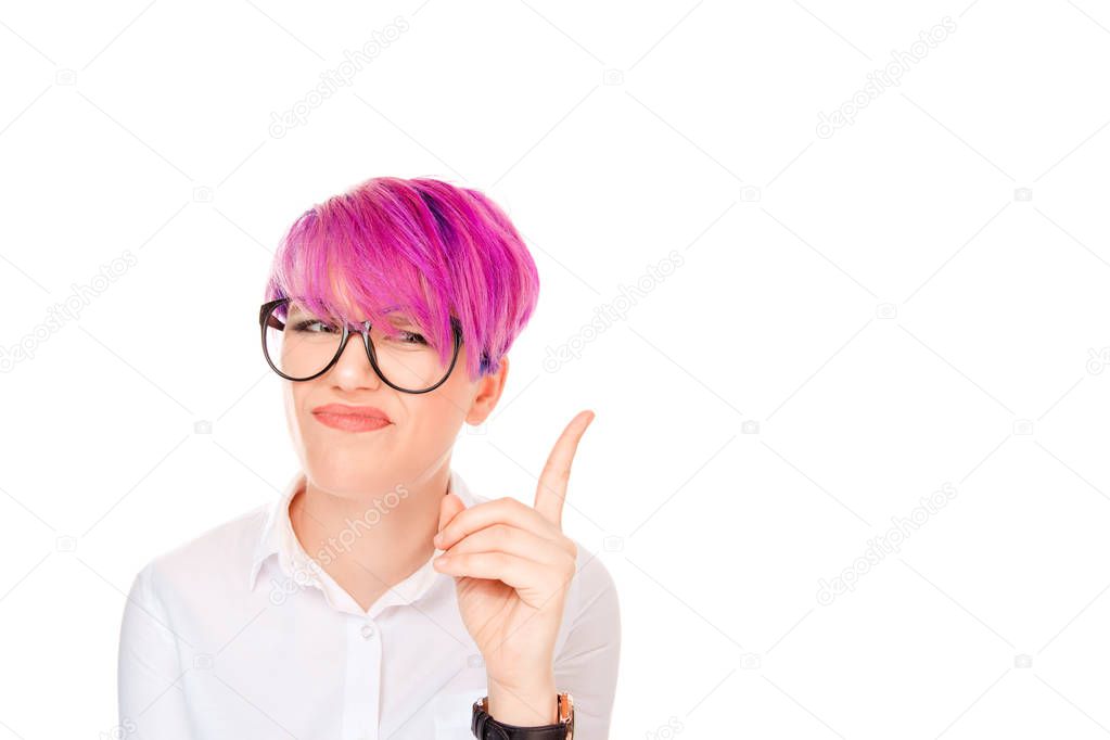 Attention, listen to me. Close up portrait of young woman wagging her finger isolated white wall background. Negative human emotions face expression, life perception, feelings, body language, attitude