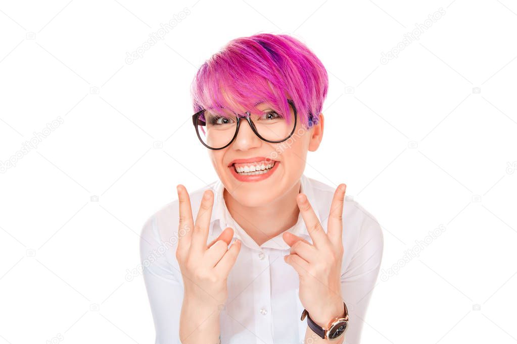 Portrait lovely happy woman with pink hair showing victory or peace sign gesture with hands isolated on white wall background. Positive face expressions human emotions body language reaction attitude.