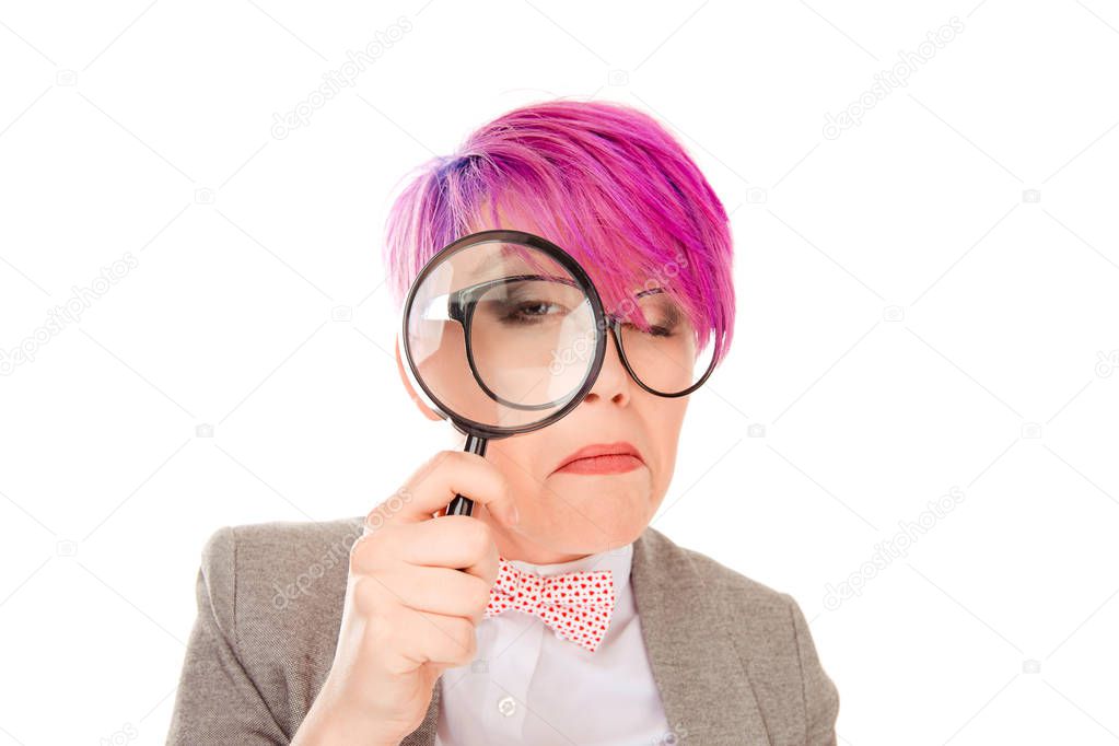 Stylish millennial woman in glasses looking through magnifying glass being scrupulous and attentive isolated on white background 