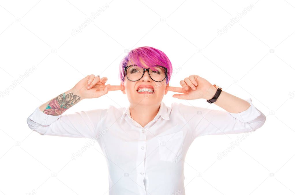 Occlude the ears. Closeup portrait young angry unhappy stressed pink short hair woman covering plugging her ears looking up, stop making loud noise it's giving me headache isolated on white background