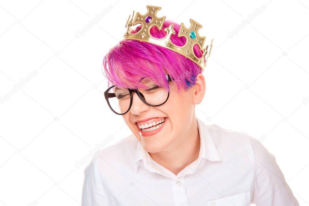 Laughing happy woman in crown and glasses