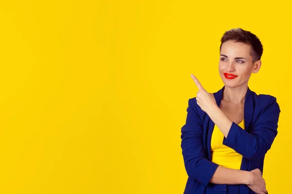 Closeup Portrait Young Happy Smiling Woman Presenting Index Finger Pointing — Stock Photo, Image